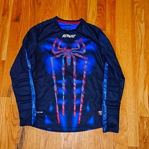 Goalie jersey with forearm pads.